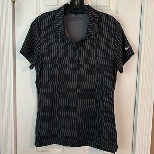 Nike women’s dri-fit golf polo . Size Medium. Black & Gret. Gently used.